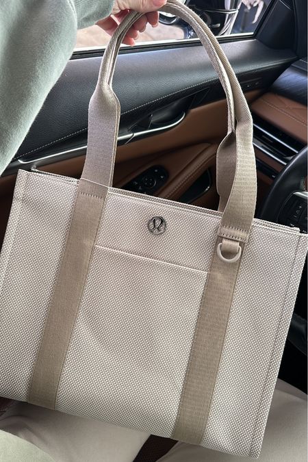 This new Lululemon Canvas Tote is SOO GOOD & will definitely sell out!!! Comes in 2 sizes but for the $20 price difference, I definitely recommend the larger style 😍 Also comes in a crossbody version!

Neutral Style, Neutral Fashion, Handbag, New Mom, Spring Styles, Spring Fashion, Work Bag, Travel Bag

#LTKMostLoved #LTKU #LTKstyletip