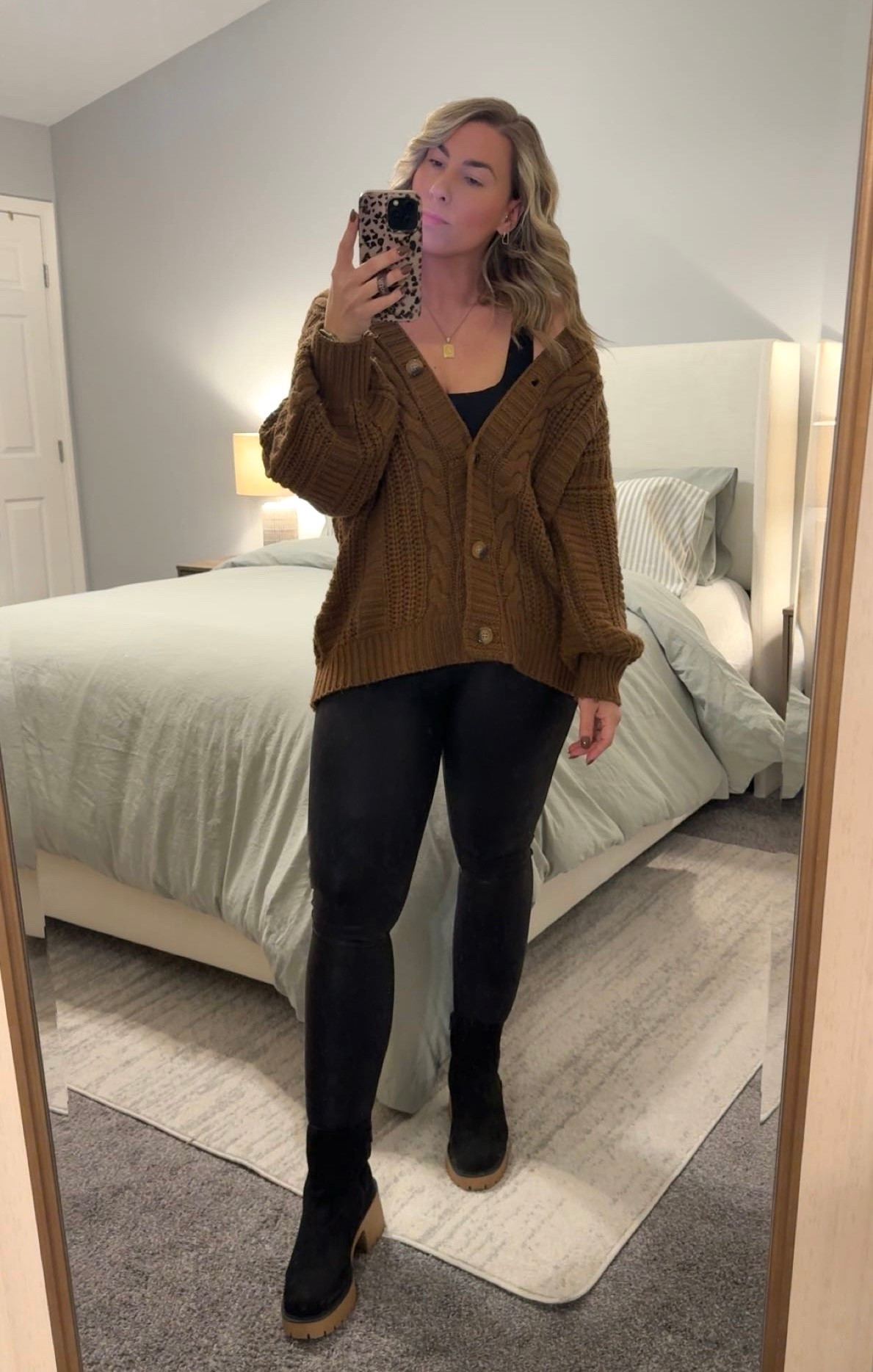 Chocolate brown Fall outfit inspo 🤎 wearing a medium in the tank and cardigan and large in faux leather leggings (and they’re on sale!). Boots are sold out but linking some similar options 🍂 Code ‘ashleymorganstyle’ for $ off a Loopy phone case 🐆 

#casualoutfit #midsizestyle #midsizeblogger #midsize #casualstyle #affordablestyle #amazon #fallootd #amazonfinds #fallstyle #fallfashion #shein #spanx #pumiey #cardigan #spanxleggings #datenightoutfit #outfitinspo #glamnetic #fallnails #chocolatebrown #homedecor #bedroomdecor #sagegreenduvet #sagegreenbedding #loopycase

#LTKSaleAlert #LTKMidsize #LTKHome