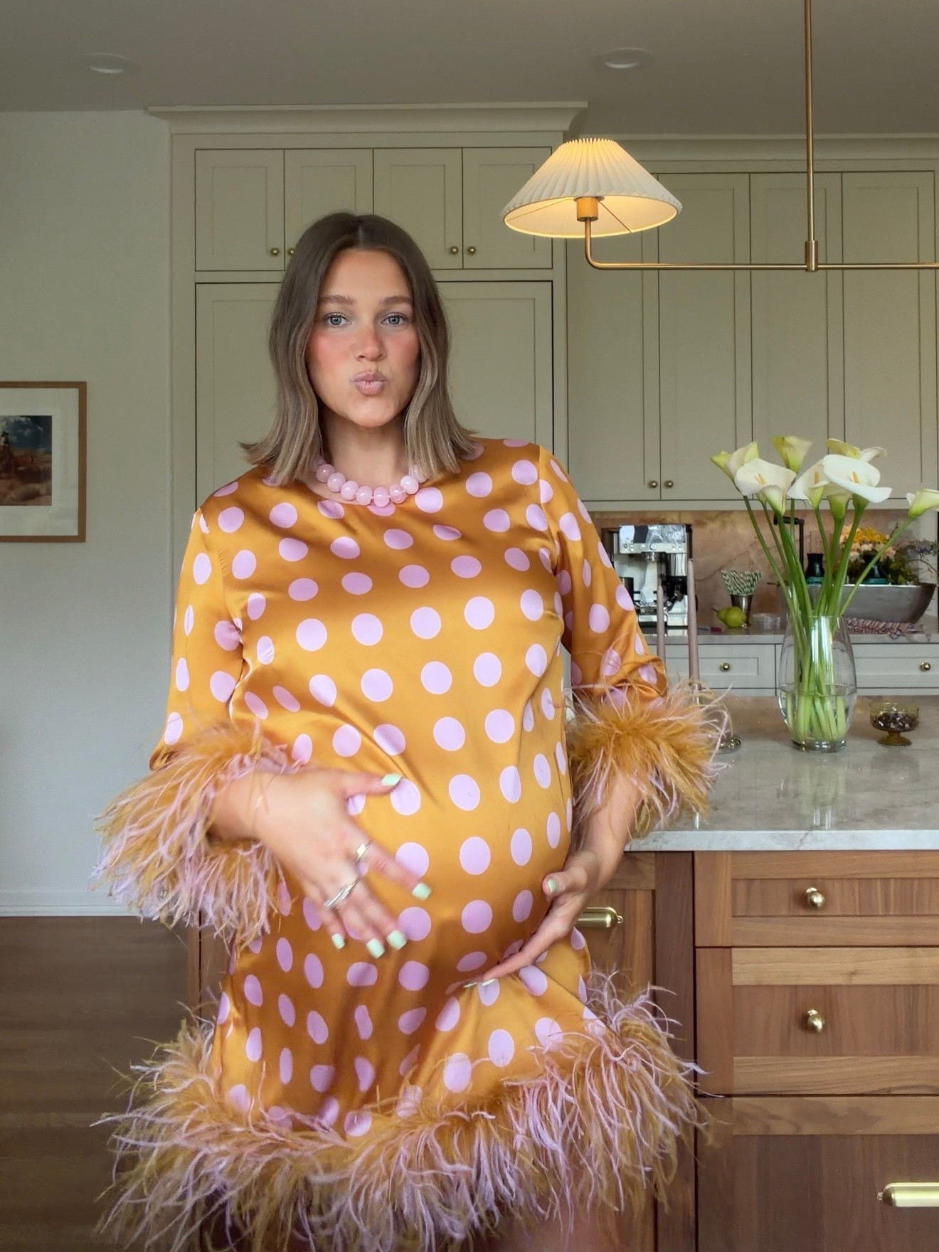 Size 10 in this polka dot feather dress (obsessed!!) I would take an 8 if I want pregnant. It has great length too I’m 5’ 5” and it’s mid to low thigh. Comfortable and so cute!! Platforms are amazing actually very easy to walk in and comfy. True to size! 

#featherdress #babyshowerdress #bresheppard #thirdtrimester #bumpstyle #playformheels #polkadots #birthdaydress