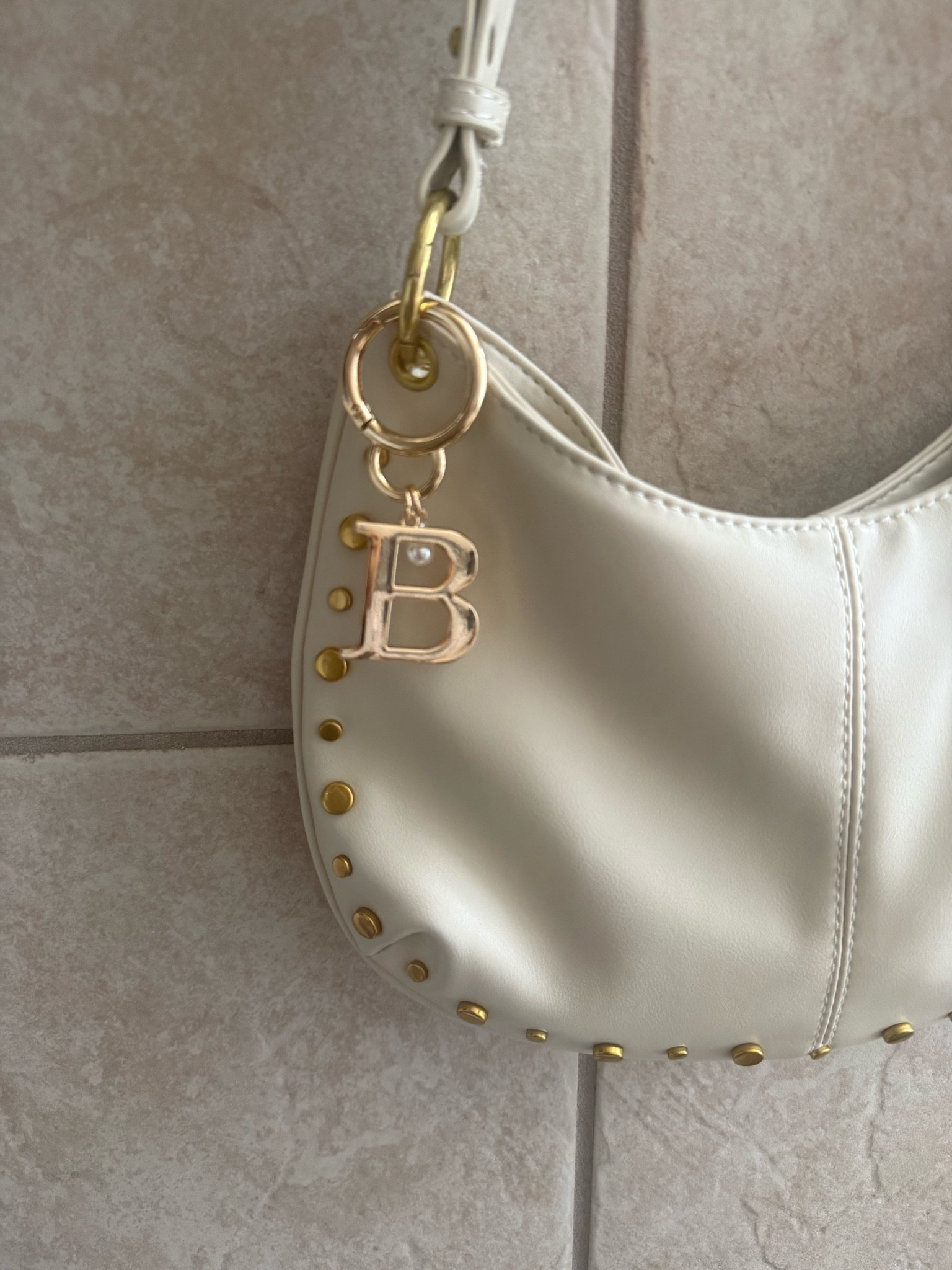 Initial bag charm with pearl. Gold bag charm, pearl bag charm and Simulated Pearl Bag Charm

#LTKTravel #LTKSaleAlert #LTKU