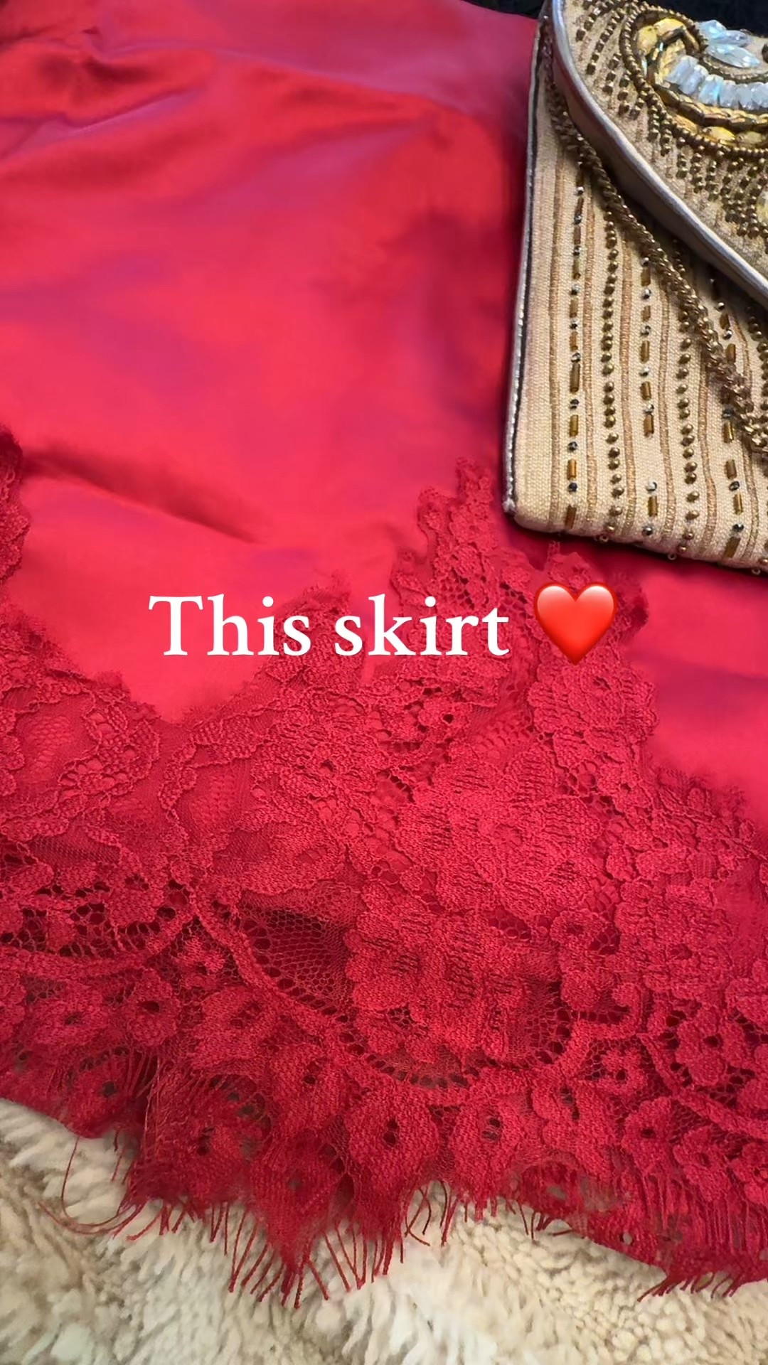 Perfect date, night, outfit, inspiration, red satin lace skirt, and black, Free People, Cami with a black, jean jacket and fancy metallic purse

#LTKOver40 #LTKHoliday #LTKootd