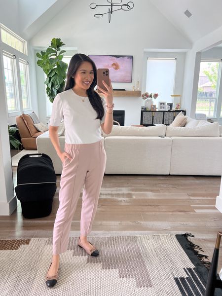 Smart casual outfit with the comfiest light pink trousers paired with a white knit top and ballet flats for a chic look. I’m wearing size XS in both the pants and top and they fit TTS! Use code HKCUNG20 for 20% off your first order! 

#LTKsalealert #LTKSeasonal #LTKstyletip