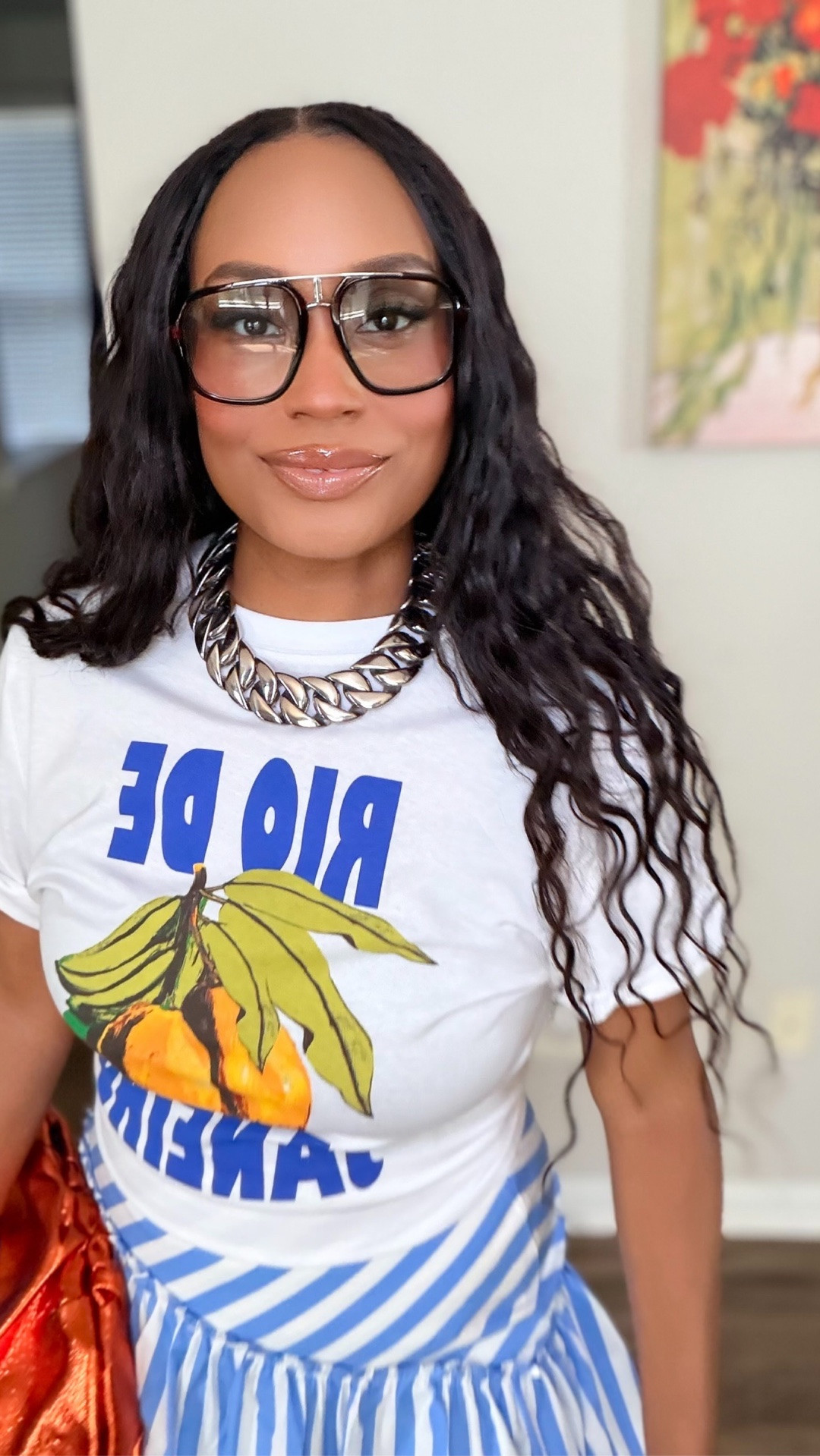 A colorful outfit can completely change your mood. 💙🍊 I linked everything I could below, including similar options where needed. My H&M tee is from last year, and if my SHEIN clutch isn’t available anymore, I linked similar styles. Happy shopping!

Linked:

* ASOS striped skirt
* Nordstrom Rack sneakers
* Amazon bangles
* Free People sunglasses
* Imani Jewelry necklace
* Similar metallic clutch if the original isn’t available
* Similar H&M fruit graphic tee if available

#LTKstorytime #LTKOver40 #LTKootd