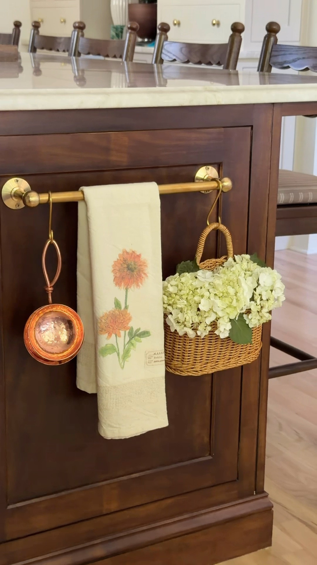 Obsessed with this brass railing for the side of our kitchen island!