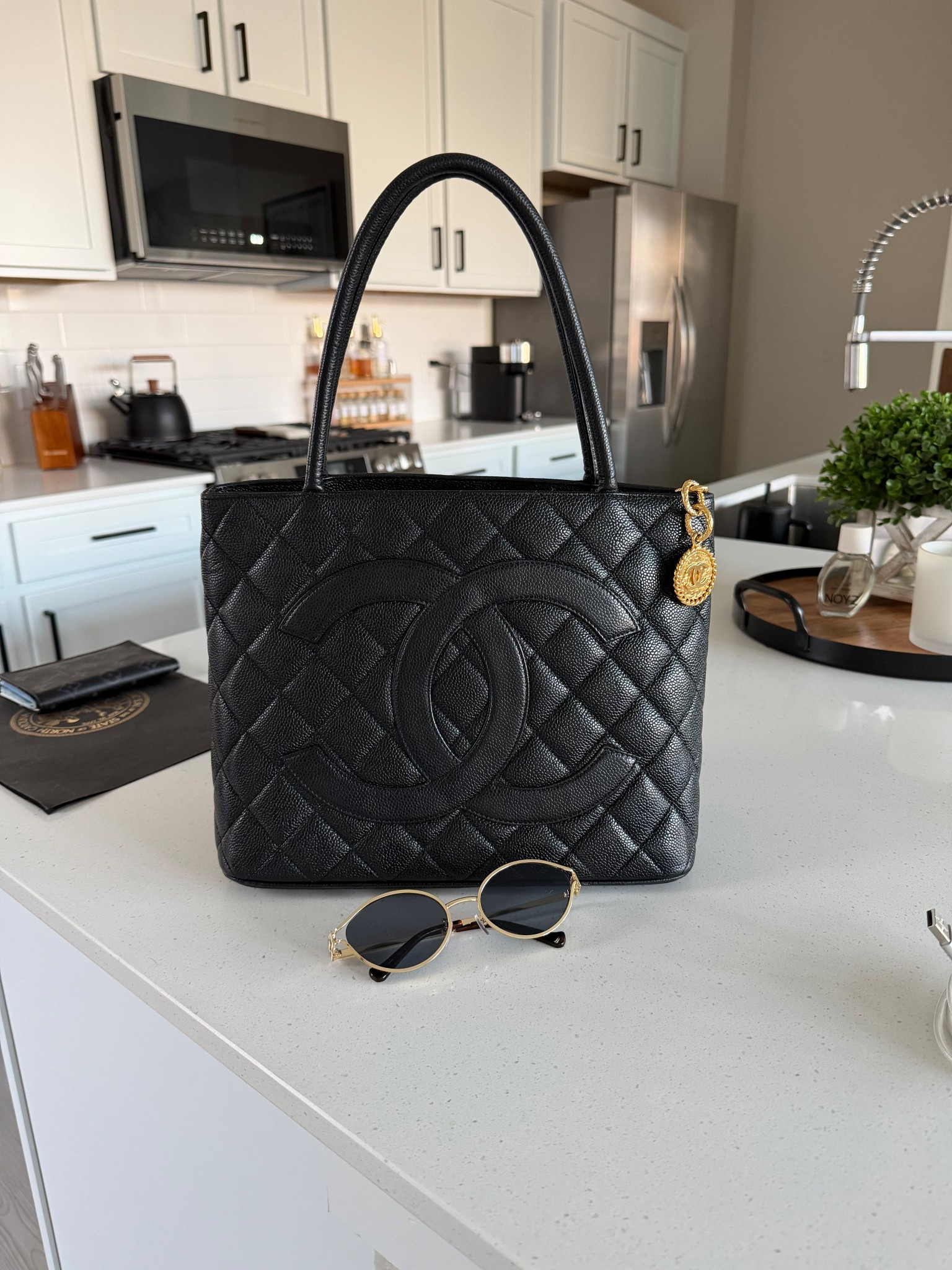 2002 Karl Lagerfeld Chanel Medallion Tote in Caviar Leather on resale! So gorg! #chanelbags #handbag #bagsale 

#LTKselfcare #LTKvlog #LTKdayinmylife