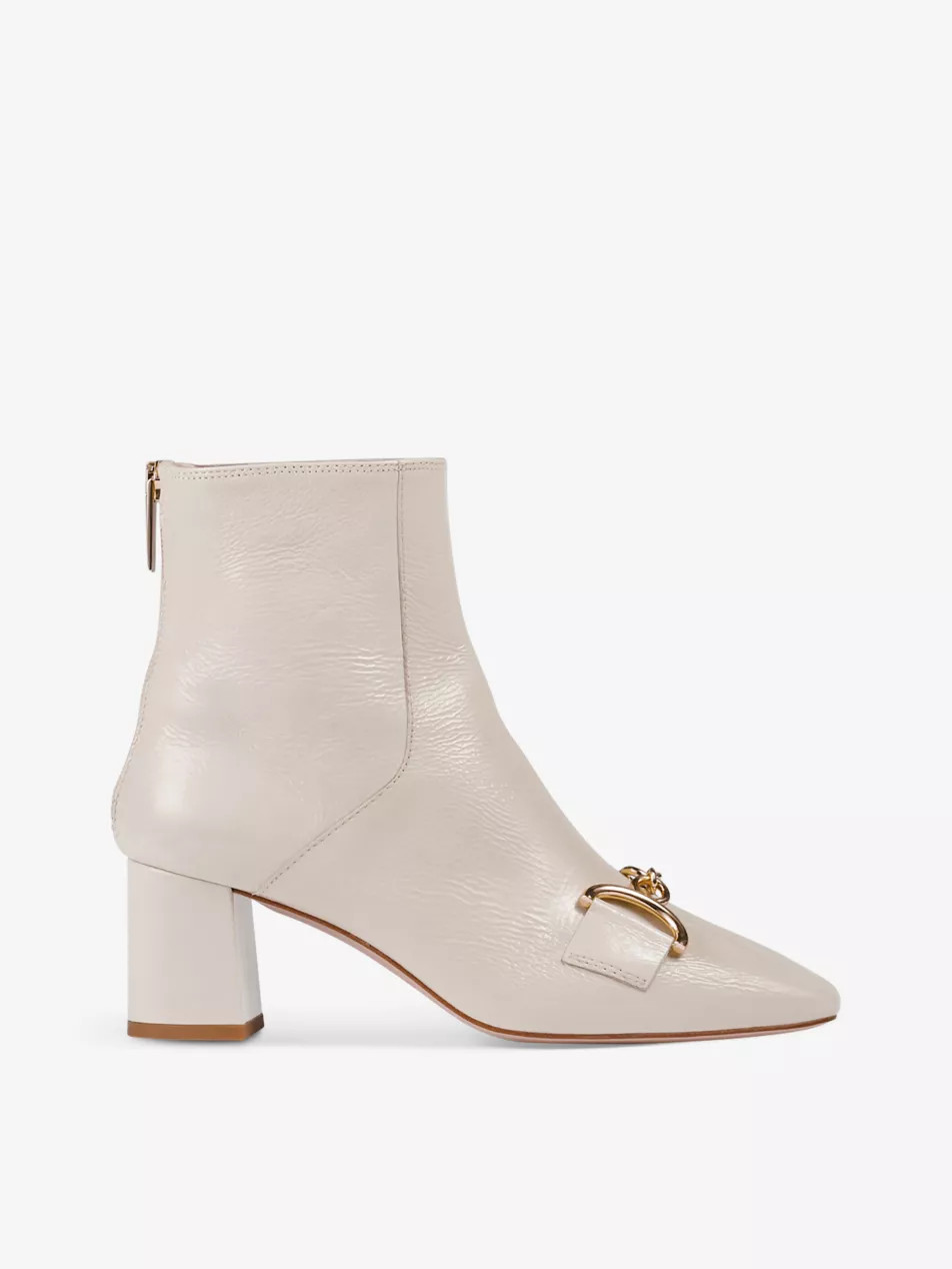 Nadina buckle-embellished patent-leather heeled ankle boots | Selfridges
