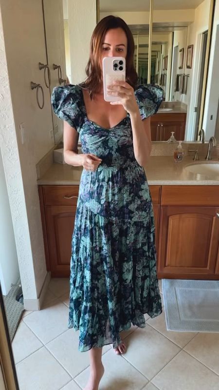 This free people maxi comes in many colors and is such a great find for a nice dinner out! I wore it while on vacation and loved the flowy feel and beautiful print! 

#LTKSeasonal #LTKtravel #LTKstyletip

#LTKVideo