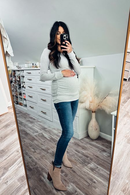 Maternity jeans and fuzzy grey maternity sweater 

#LTKbump #LTKCyberWeek #LTKSeasonal