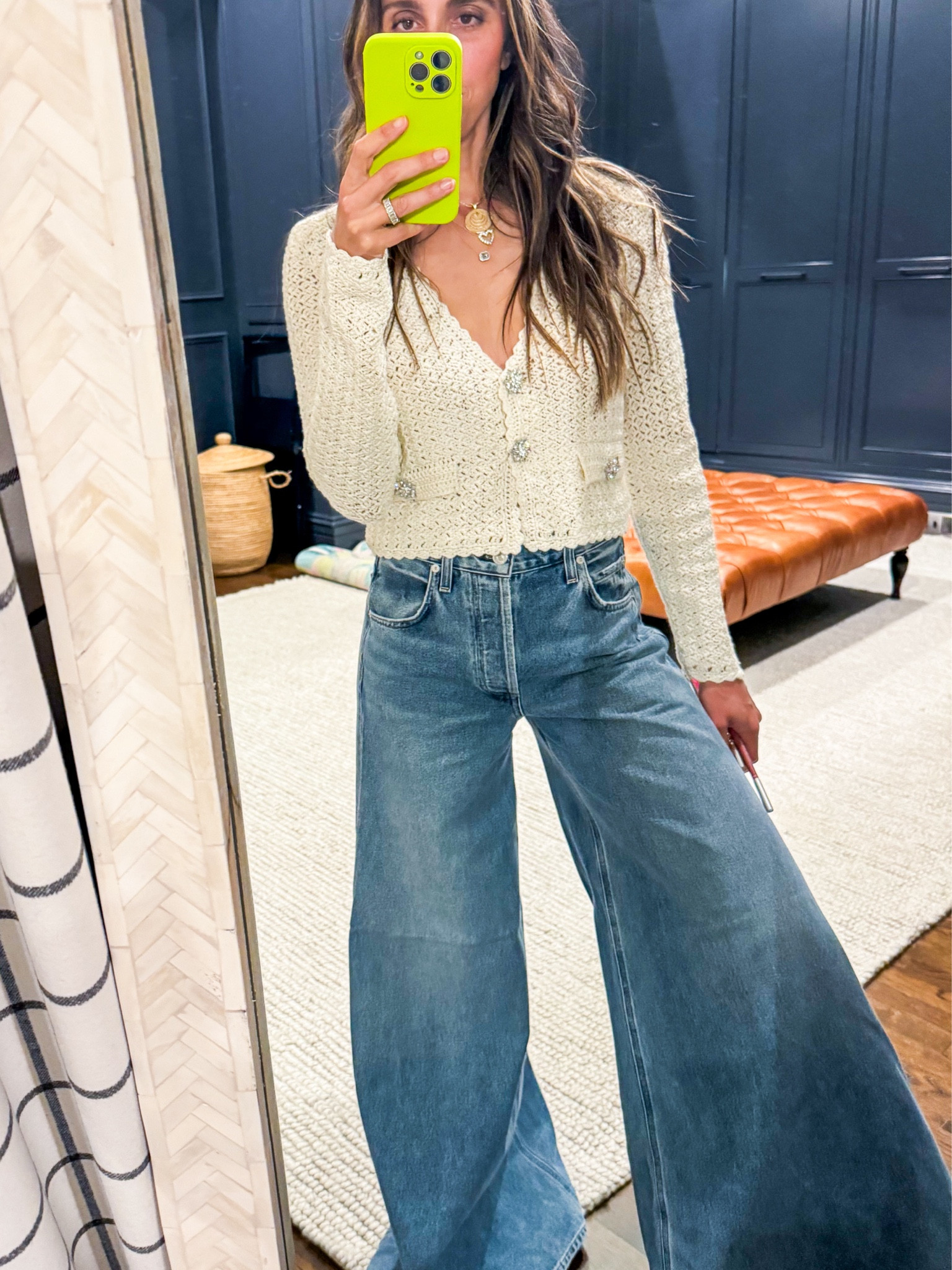 Jeans run big. I’m wearing a size 24. They are long so I will have to have them. Top is a size small.