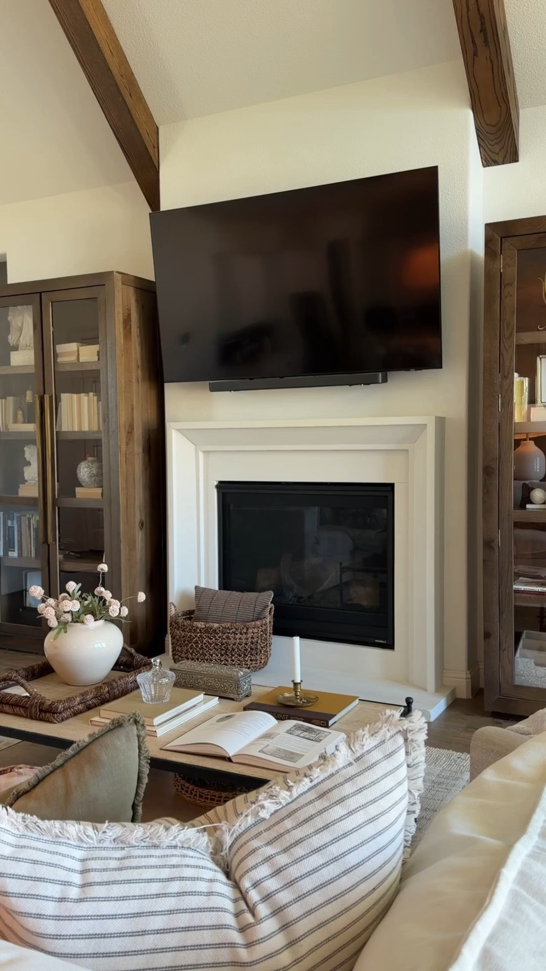Curated home, living room, collected, tall cabinets, coffee table, travertine, rug, sofa, home decor

#LTKSaleAlert #LTKHome