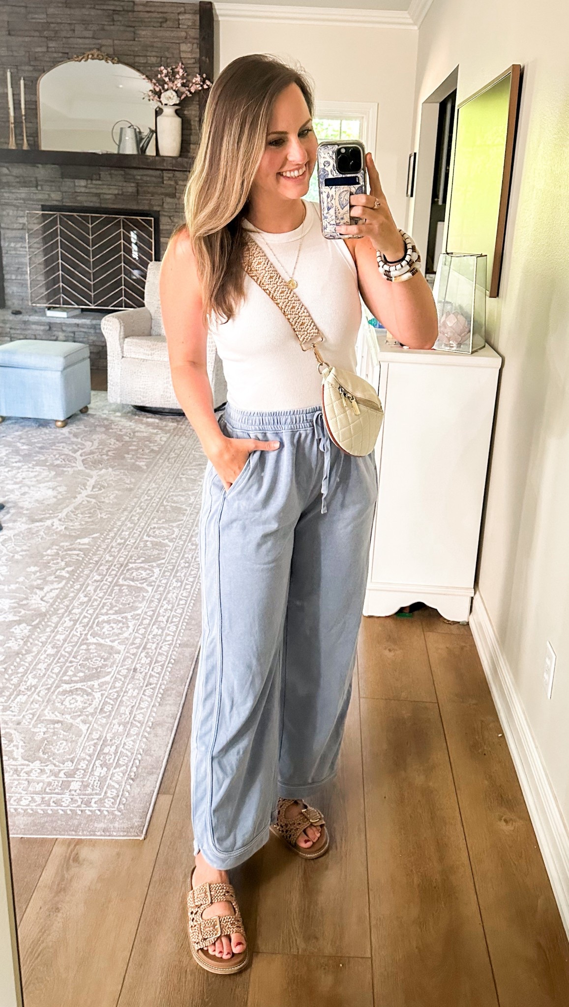 The comfiest sweatpants you’ll be seeing me in this fall! From Amazon and have the cutest rounded hem & monotone stripe that makes the legs look longer! High waisted, drawstring waist and comes in lots of colors. Paired with Amazon gold compass necklace I wear everyday, ribbed tank top, crossbody bag, & Target rope sandals. 

Millennial mom outfit, Casual mama style, lounge pants, aerie look for less, sweat pants and a tag.

#LTKFindsUnder50 #LTKStyleTip



#LTKmomlife #LTKootd #LTKActive
