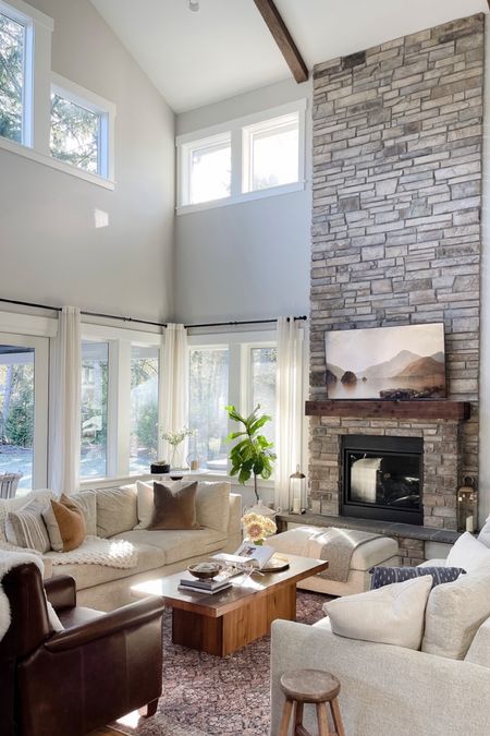 We love our two story open concept living room! 

Loloi rug | kipton sectional | coffee table | living room ideas | living room decor | modern farmhouse style | spring pillows| leather recliner | vintage stools

#LTKhome #LTKstyletip #LTKSeasonal
