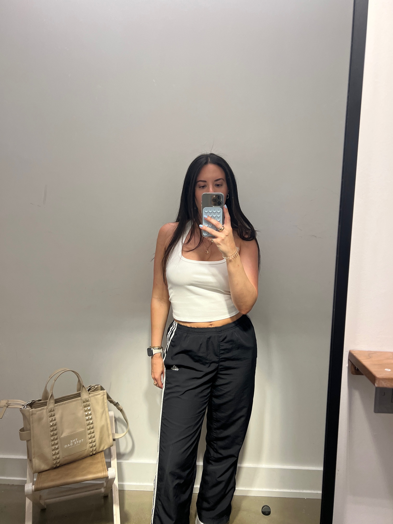 Marc Jacob’s Studded Medium Tote Bag x Target Halter x Adidas Track Pants

#LTKSummerSales #LTKItBag #LTKxNSale