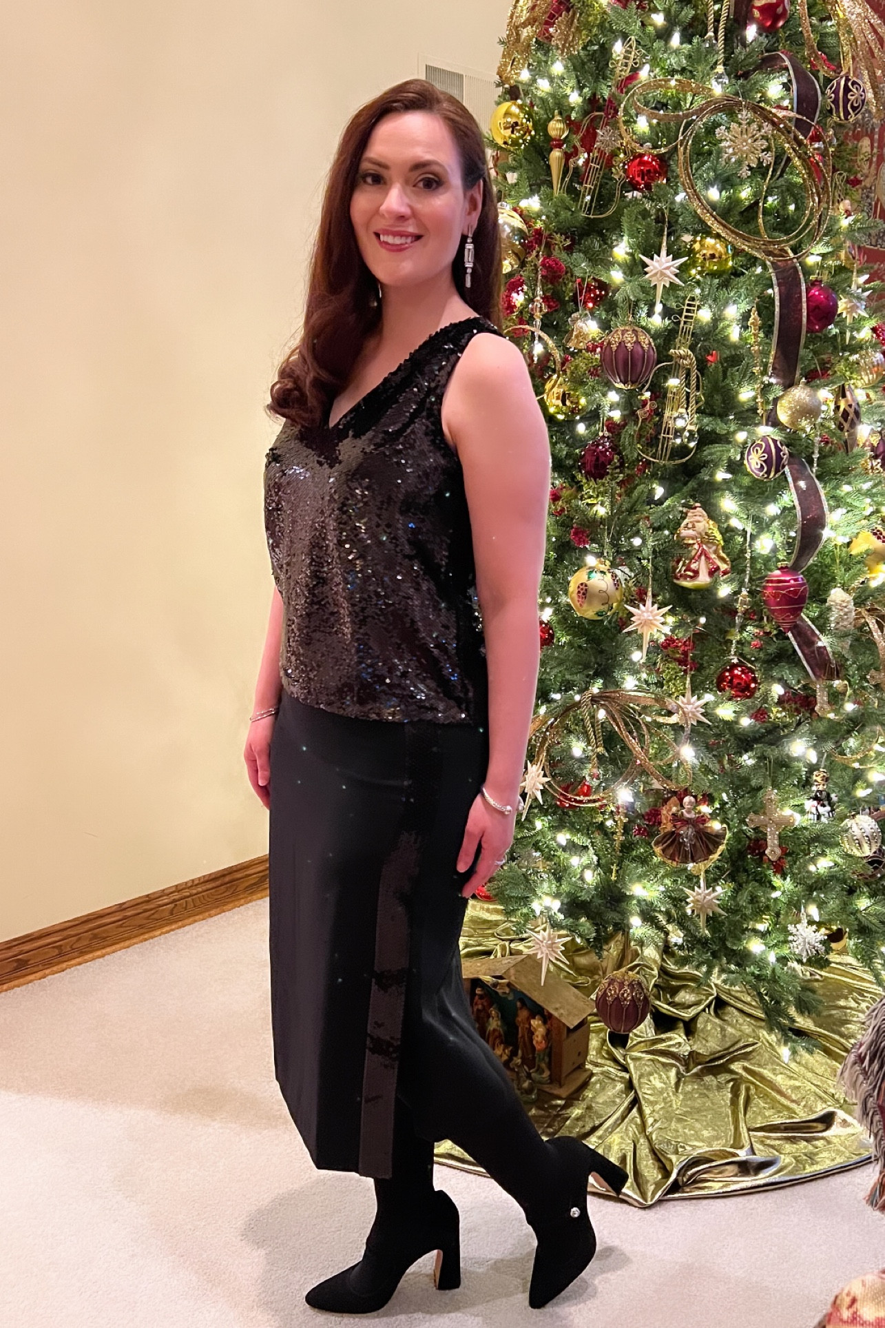 Twelve Days of Holiday Outfit Ideas - for a cute Christmas party outfit opt for a two pice instead of a dress. I’m wearing the v neck sleeveless sequin top and black sequin side panel midi skirt all from Ann Taylor - #holidayoutfitideas #christmasdresses #thisisann #holidaystyle #midiskirt #sequins

#LTKparties #LTKstyletip #LTKHoliday