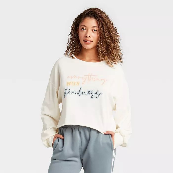 Women's Conquer with Kindness Cropped Graphic Sweatshirt - Cream | Target