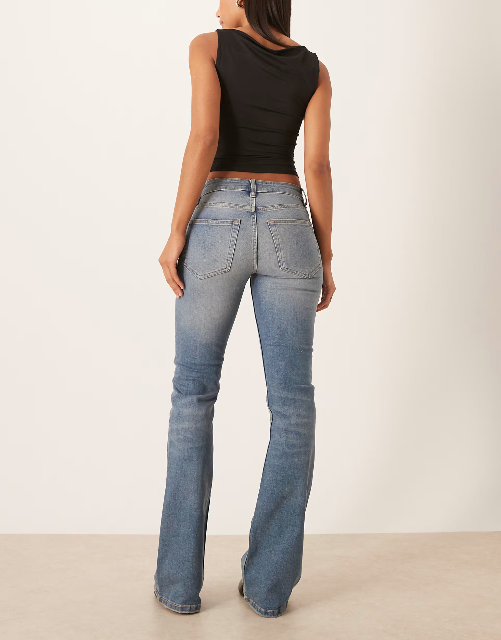 ASOS DESIGN low rise bootcut jeans in midwash  | ASOS | ASOS (Global)