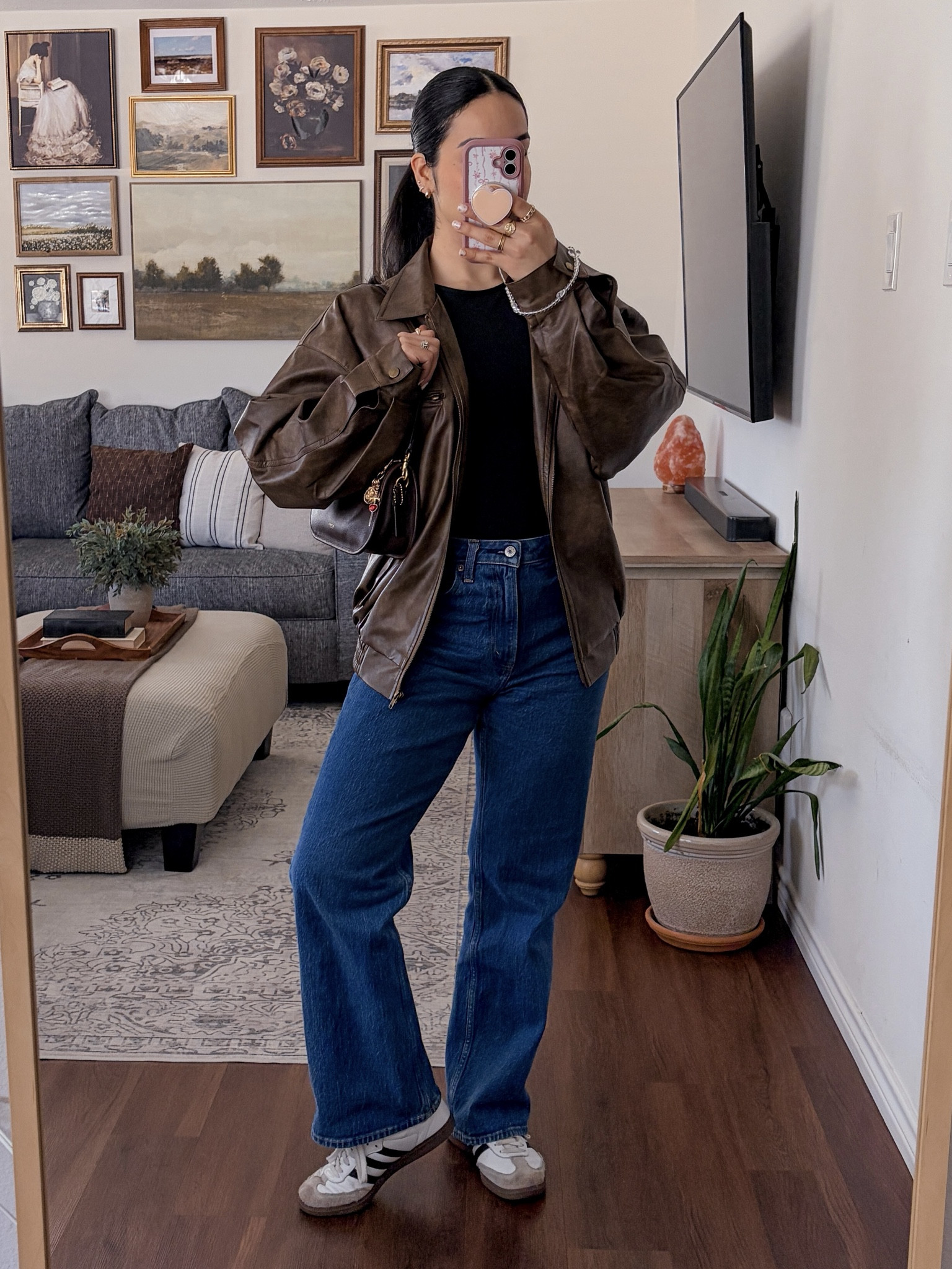 outfit of the day: wearing one of my favorite jeans from abercrombie, my beloved new coach bag, and old faithful adidas sambas sneakers 🤎 get ready with me, grwm outfit video, casual grwm, everyday grwm, casual outfit inspo, outfit of the day video, realistic grwm, lifestyle grwm, aesthetic grwm video, abercrombie jeans outfit, adidas sambas outfit, black bodysuit outfit, faux leather moto jacket, brown leather jacket outfit, commense jacket outfit, casual chic outfit, everyday outfit formula, coach waverly shoulder bag, coach bag outfit, brown shoulder bag styling, maison margiela perfume, perfume aesthetic, scent of the day, cool girl casual, pinterest inspired outfit, effortless chic style, elevated casual vibes, neutral outfit inspo, modern city style, everyday fashion content, grwm pinterest, casual outfit inspo pinterest, everyday outfit video, fashion reel ideas, lifestyle content ideas, nail day grwm  

 #LTKNYFW #LTKgrwm #LTKootd