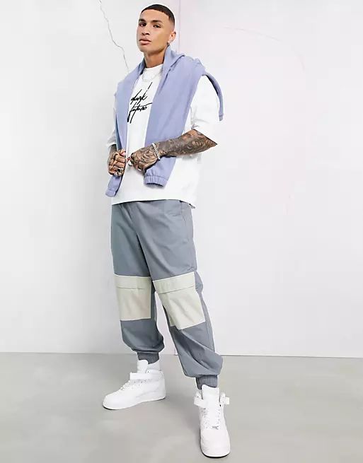 ASOS Dark Future oversized tapered pants with contrast panels and embroidery | ASOS (Global)