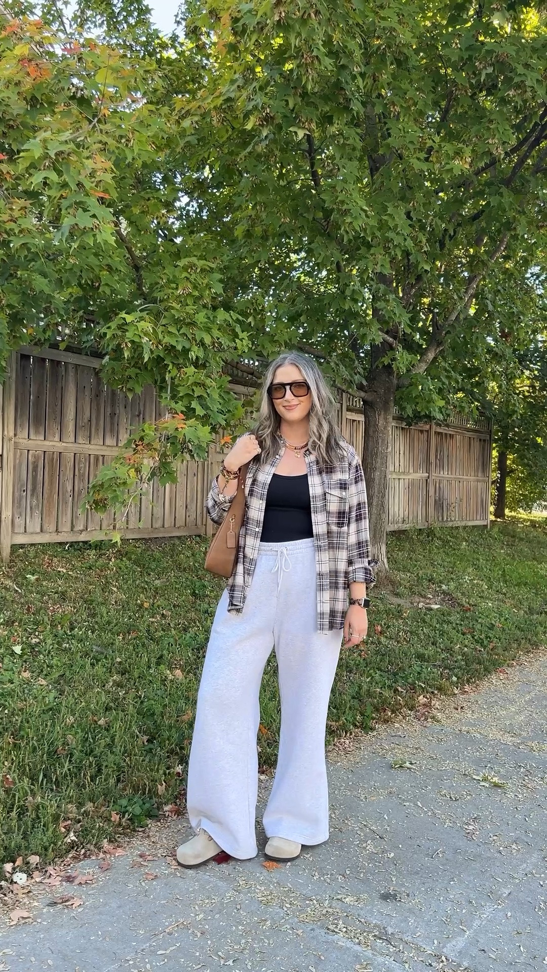 Fall ootd! Wearing M in the bra free tank, L in the wide leg sweatpants (could have done M). Sized up to XL in the plaid flannel shirt for an oversized fit. I’m a 9.5-10 and wear a 40 in the Birkenstock clogs

#LTKfall #LTKsale #LTKstyletip