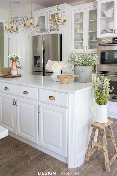 The evolution of our white kitchen shows how we transformed a dark, outdated room over time and completed a chic kitchen remodel on a budget. Here’s what I used! 

#LTKhome #LTKstyletip #LTKfamily