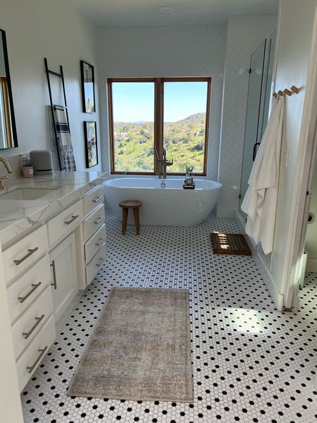 Loving how this rug has made our master bathroom feel lighter! 



#LTKhome