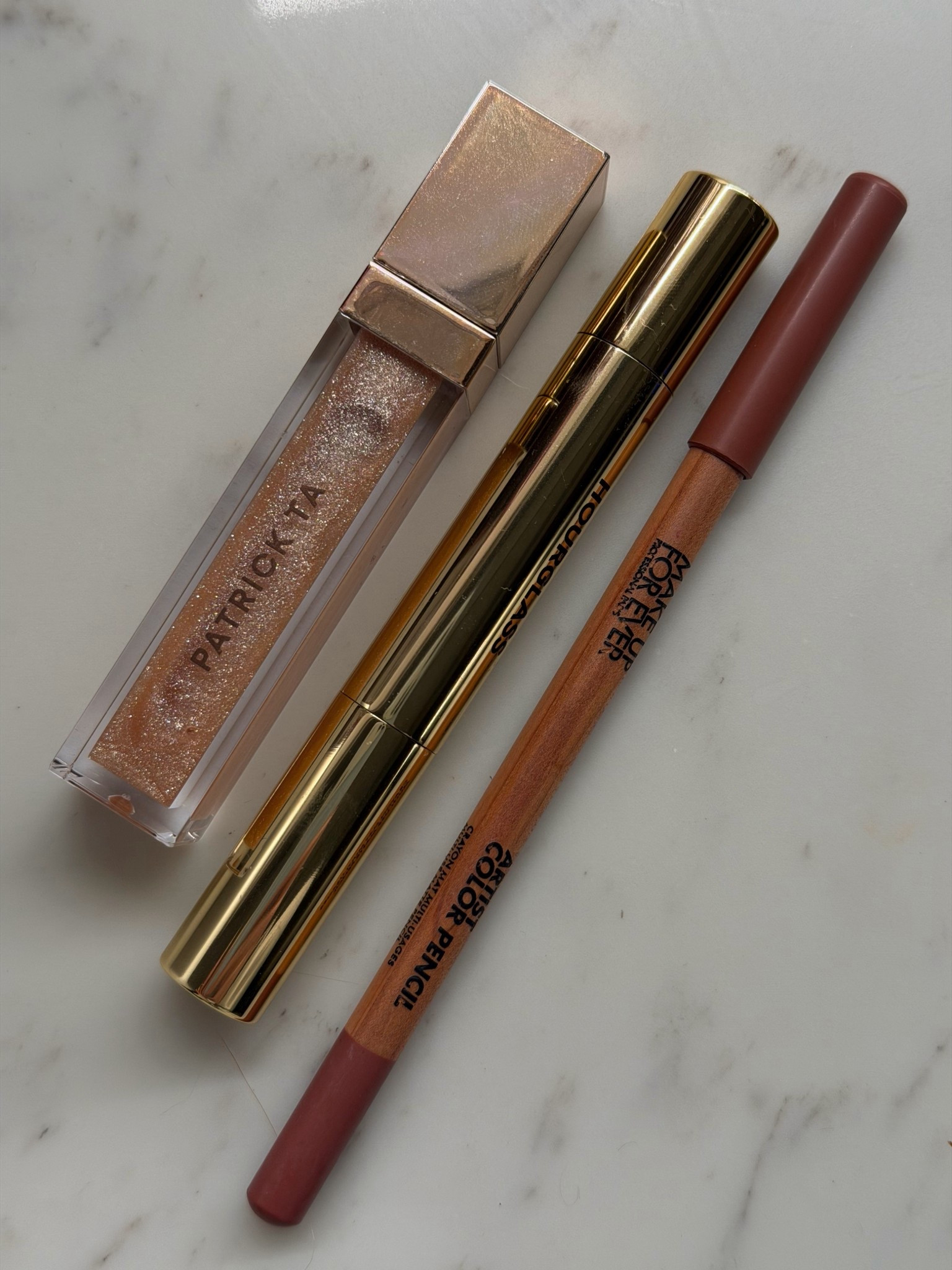 Favorite lip combo
Patrick ta she’s expensive
Hourglass wander
Makeup forever wherever walnut 

#LTKBeauty #LTKSaleAlert