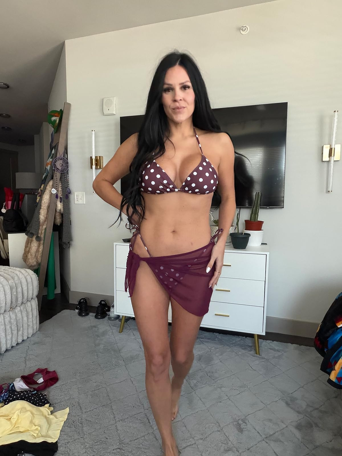 Beach ready in polka dots. This chocolate brown and white polka dot bikini paired with a matching sheer sarong is the perfect poolside look. #SwimStyle #PolkaDotBikini #LTKswim 

 #LTKSpringSale #LTKdayinmylife #LTKgrwm