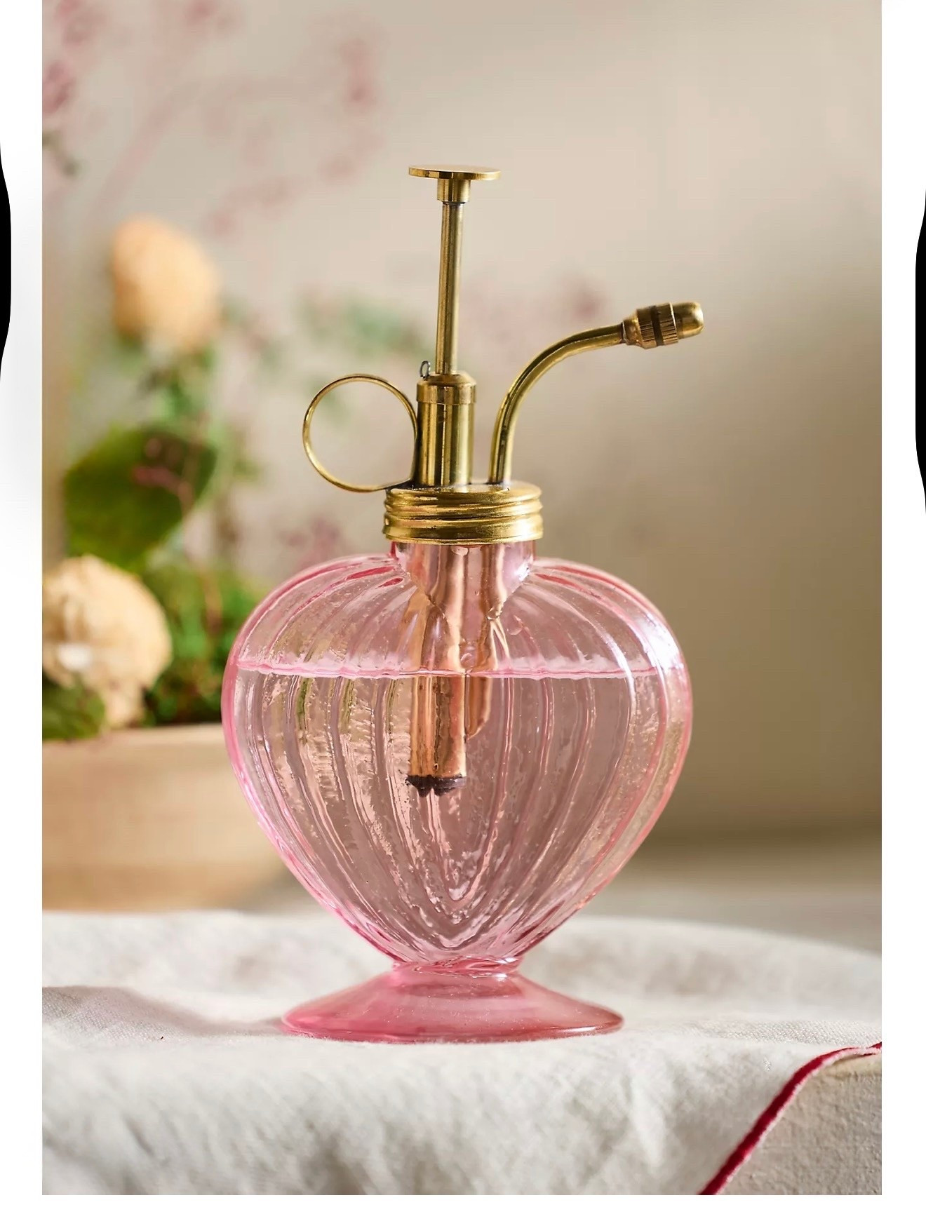 Heart Glass Miste
Terrain

A sweet solution for indoor gardening, this heart-shaped glass mister is topped with a polished, brass-finish mechanism. A terrain-exclusive design, from our very own garden utility team

#LTKSeasonal #LTKFindsUnder50 #LTKHome