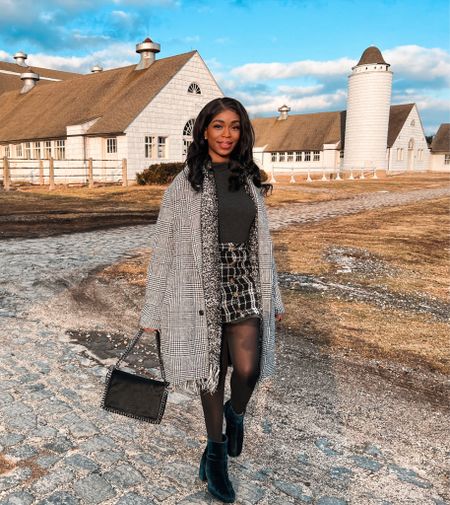 I’ve been living in skirts this Fall. Styled this one with a mock neck top, plaid coat and Zara bag and boots 🤍✨

#LTKfit #LTKstyletip #LTKSeasonal