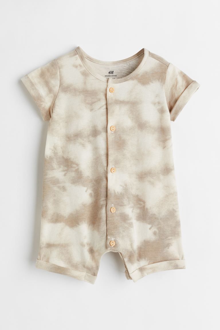 Conscious choice  Short-sleeved romper suit in soft cotton jersey. Buttons at front, concealed sn... | H&M (US + CA)