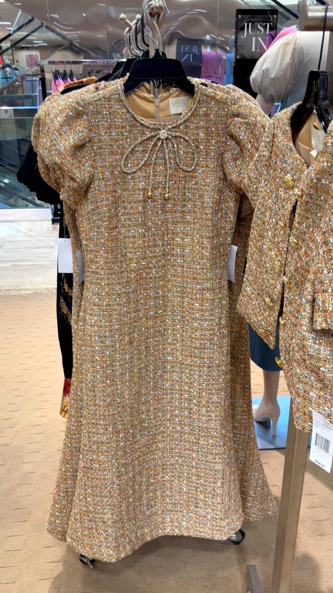 Perla Tweed Crew Neck Corded Rhinestone Bow Cap Puff Sleeve Midi Dress
Perfect to wear at a wedding as a guest 

#LTKValentine #LTKOver40 #LTKWedding