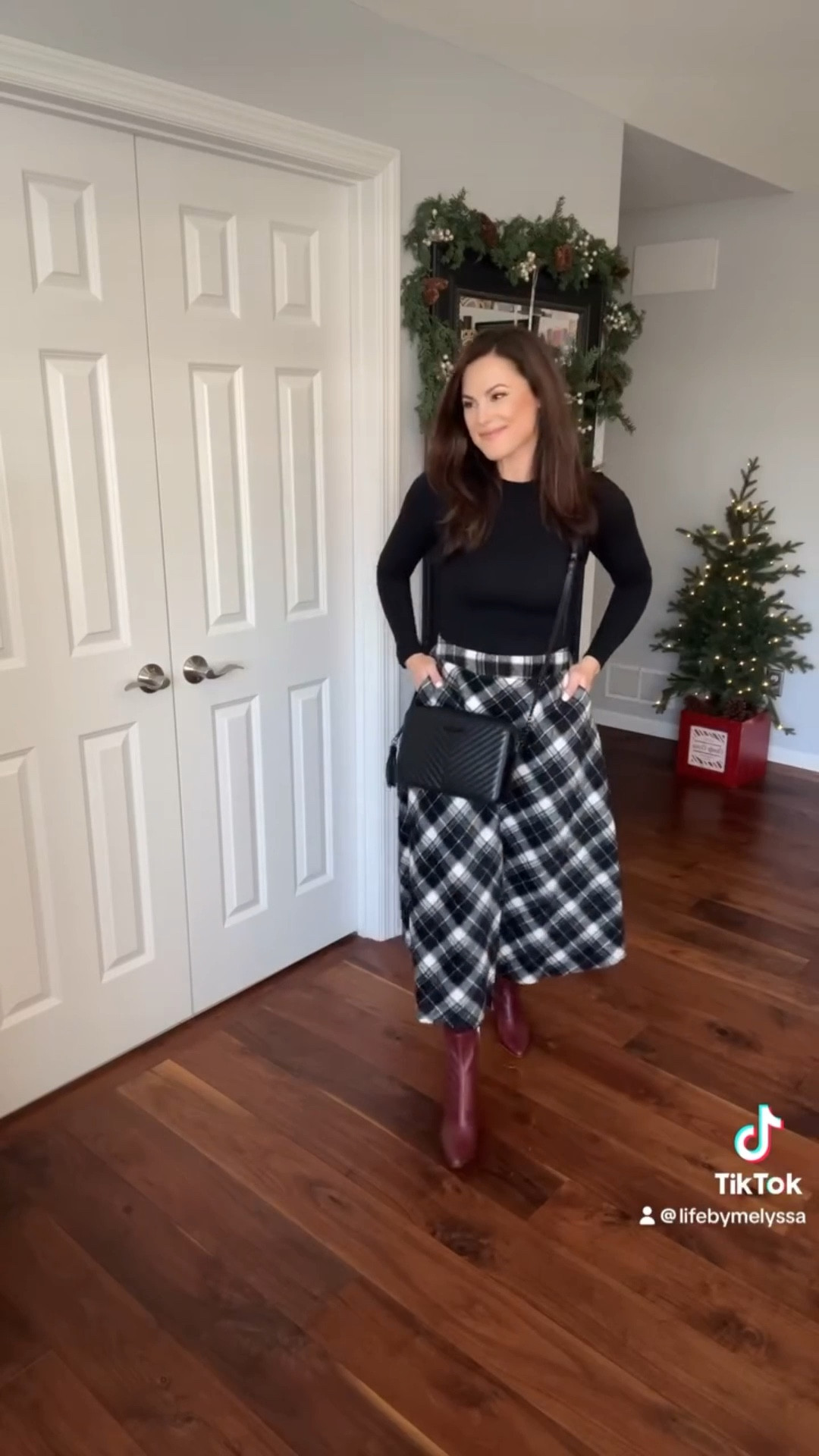 🎄✨ On the 1st day of Christmas, I’m sharing the perfect holiday outfit! 
🛍️🎅🏻

This long plaid skirt is giving all the festive feels, paired with my favorite double-lined long-sleeve T-shirt. These adorable burgundy booties and chic black crossbody purse complete the look!

Busy moms, this outfit is your go-to for holiday parties, family gatherings, or even a festive day out—stylish, comfy, and oh-so-easy! 🎅💃


#LTKOver40 #LTKootd #LTKHoliday