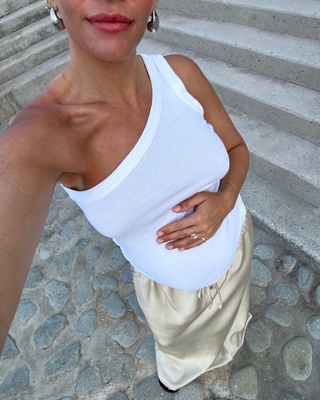 The perfect nude satin slip skirt — drawstring makes it easy to wear at different lengths; super comfy 

Silver earrings are similar to the bottega oversized tear drop globes 

#LTKbump #LTKtravel #LTKstyletip