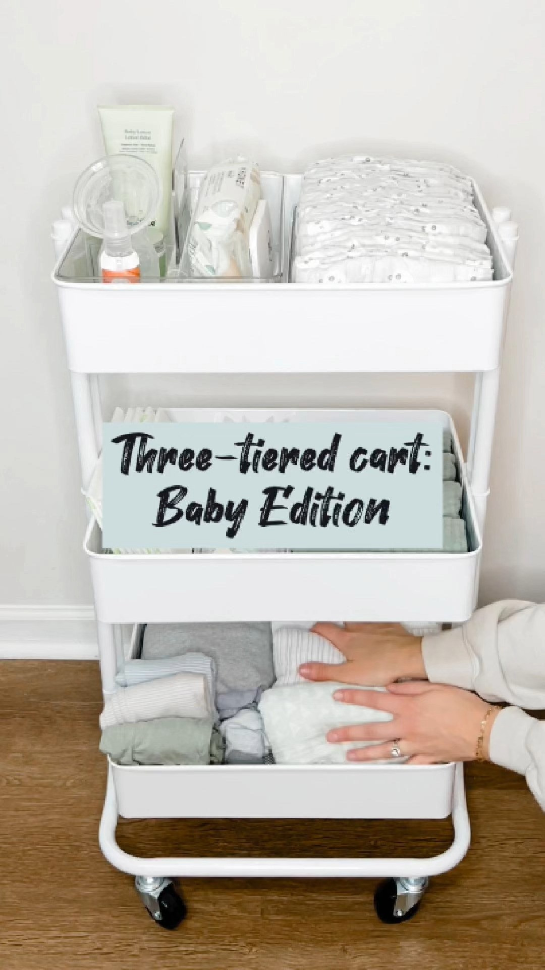 We love these three-tiered carts for their versatility. This one has been perfectly curated and organized to take care of the tiniest of clients! It's got most everything your baby needs and the wheels mean it can be moved around throughout the day and night.

Let us know if your little one needs some organization. We'd love to help! 

 