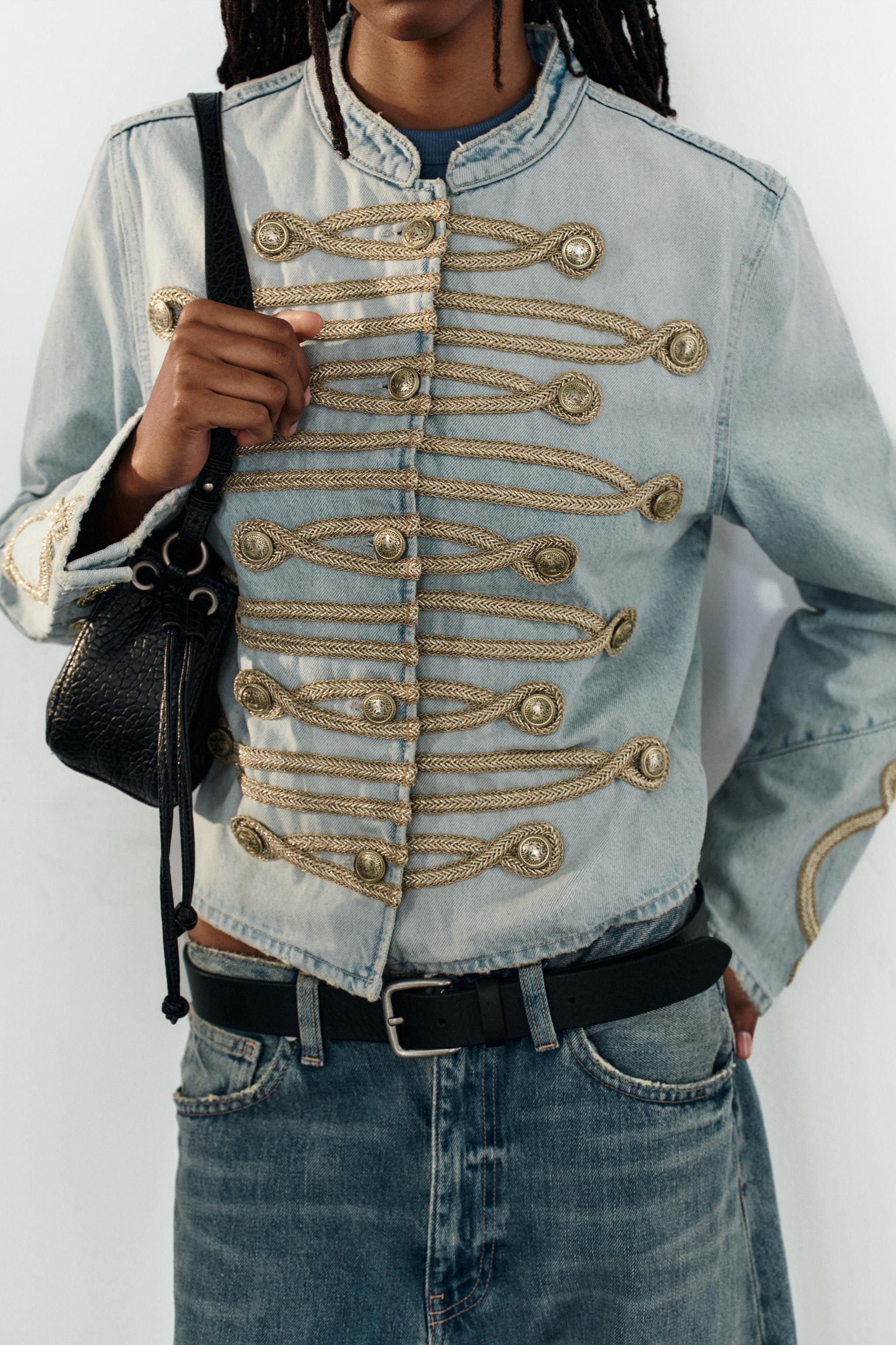 Round neck jacket with long sleeves. Features button appliqu\u00e9 and contrasting fabric detaili... | Zara US