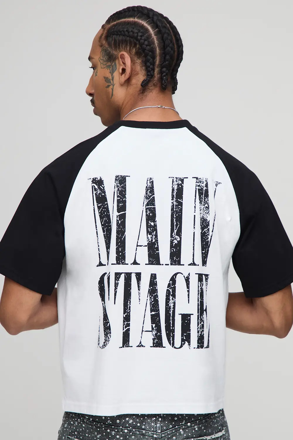 Black boohooMAN Shrunken Boxy Short Sleeve Raglan Graphic T-Shirt | Boohoo | Boohoo.com (UK & IE)