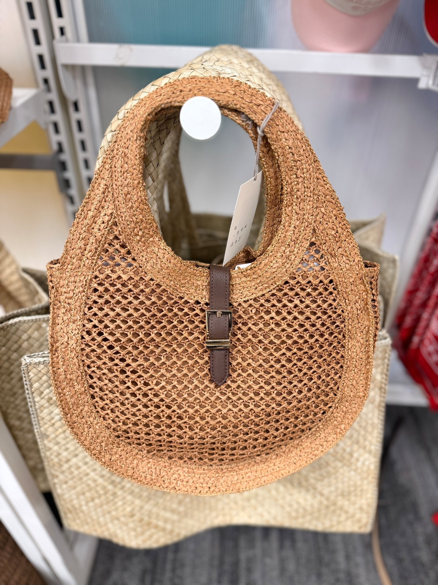 Vacation mode activated! ☀️🤎 Spotted this Straw Oval Shoulder Bag from A New Day at Target and it’s such a cute warm-weather staple. Lightweight, easy to carry, and perfect for beach days, resort wear, or everyday summer outfits. I linked this one plus a few other adorable vacation bags I found! 👜 #VacationStyle #SummerBag #SummerAccessories 

#LTKSeasonal #LTKSaleAlert #LTKootd