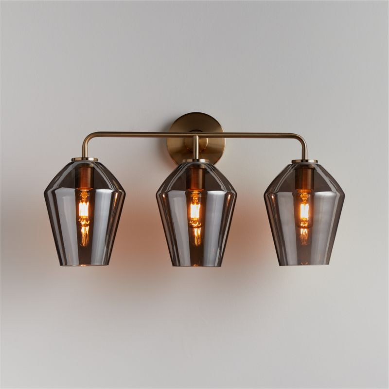 Arren Brass 3-Bathroom Vanity Light Wall Sconce with Silver Angled Shades | Crate & Barrel | Crate & Barrel