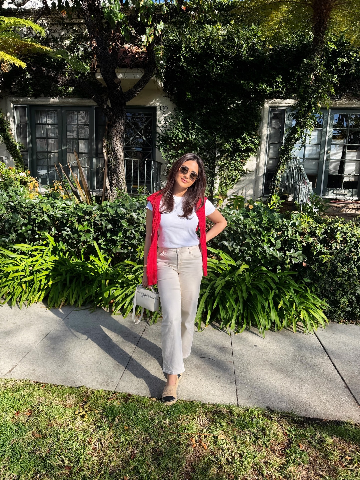 Spring day in Beverly Hills, kept simple and clean.

Cream relaxed jeans paired with a white crewneck tee, finished with a red cable-knit sweater from Ralph Lauren worn over the shoulders. Cream espadrilles from Chanel and oval sunglasses complete the look.

#LTKgrwm #LTKdayinmylife #LTKootd