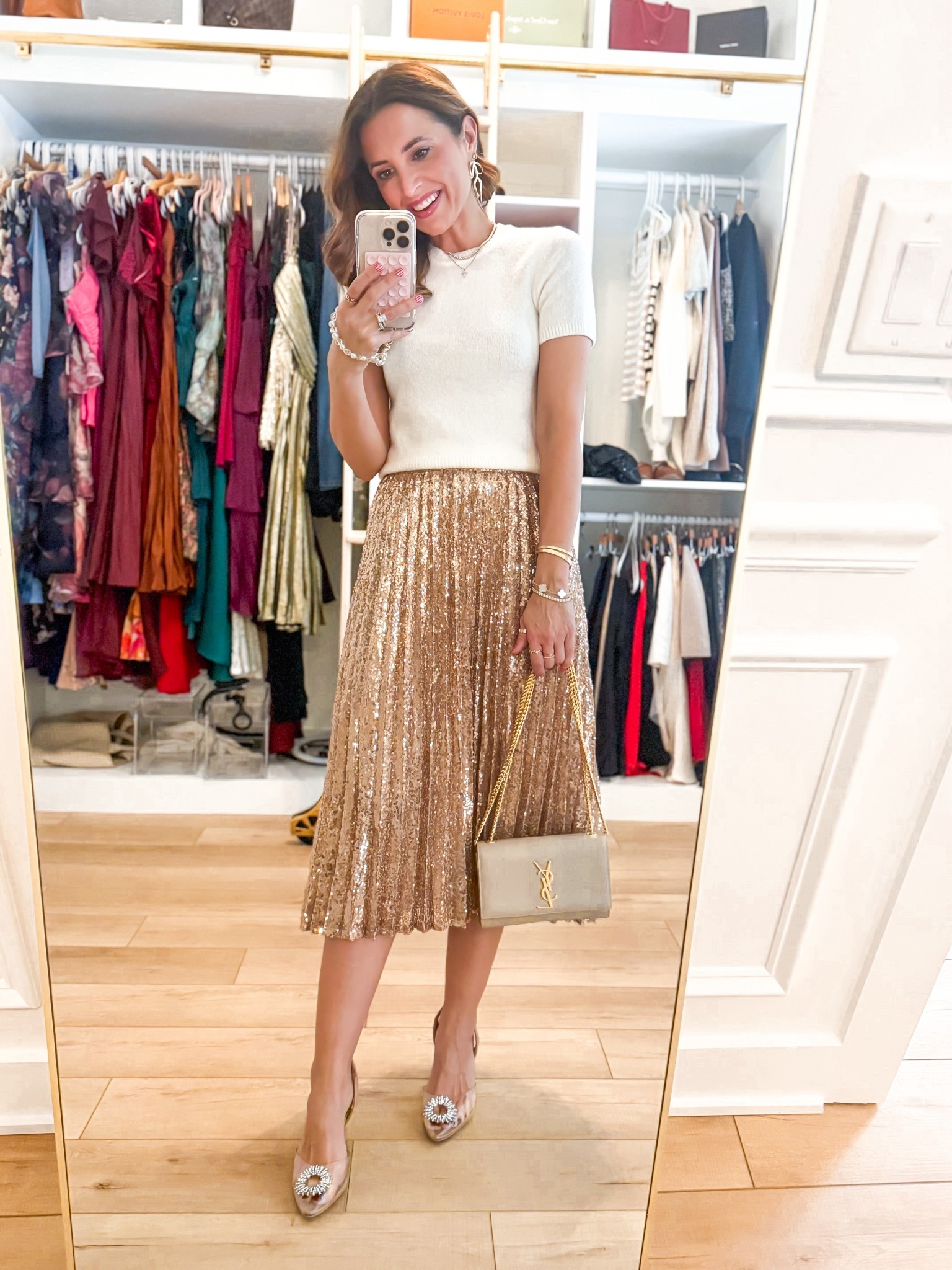 My Christmas Eve outfit! This sequin midi skirt would be perfect for NYE or a party, too. Wearing XS. Cream sweater top - linking similar. Wedding guest outfits. YSL bag. NYE outfit. Party outfit. 

#LTKHoliday #LTKootd #LTKWedding