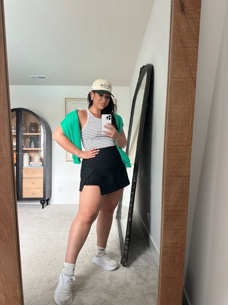 Casual spring OOTD - wearing a large in everything!


Midsize outfit idea, Embroidered trucker hat, wrap skort, striped top, athleisure style, sports mom outfit, preppy look

#LTKActive #LTKMidsize #LTKStyleTip