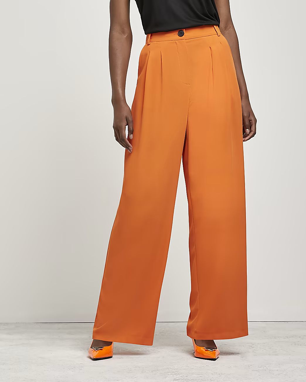 Orange wide leg trousers | River Island (UK & IE)