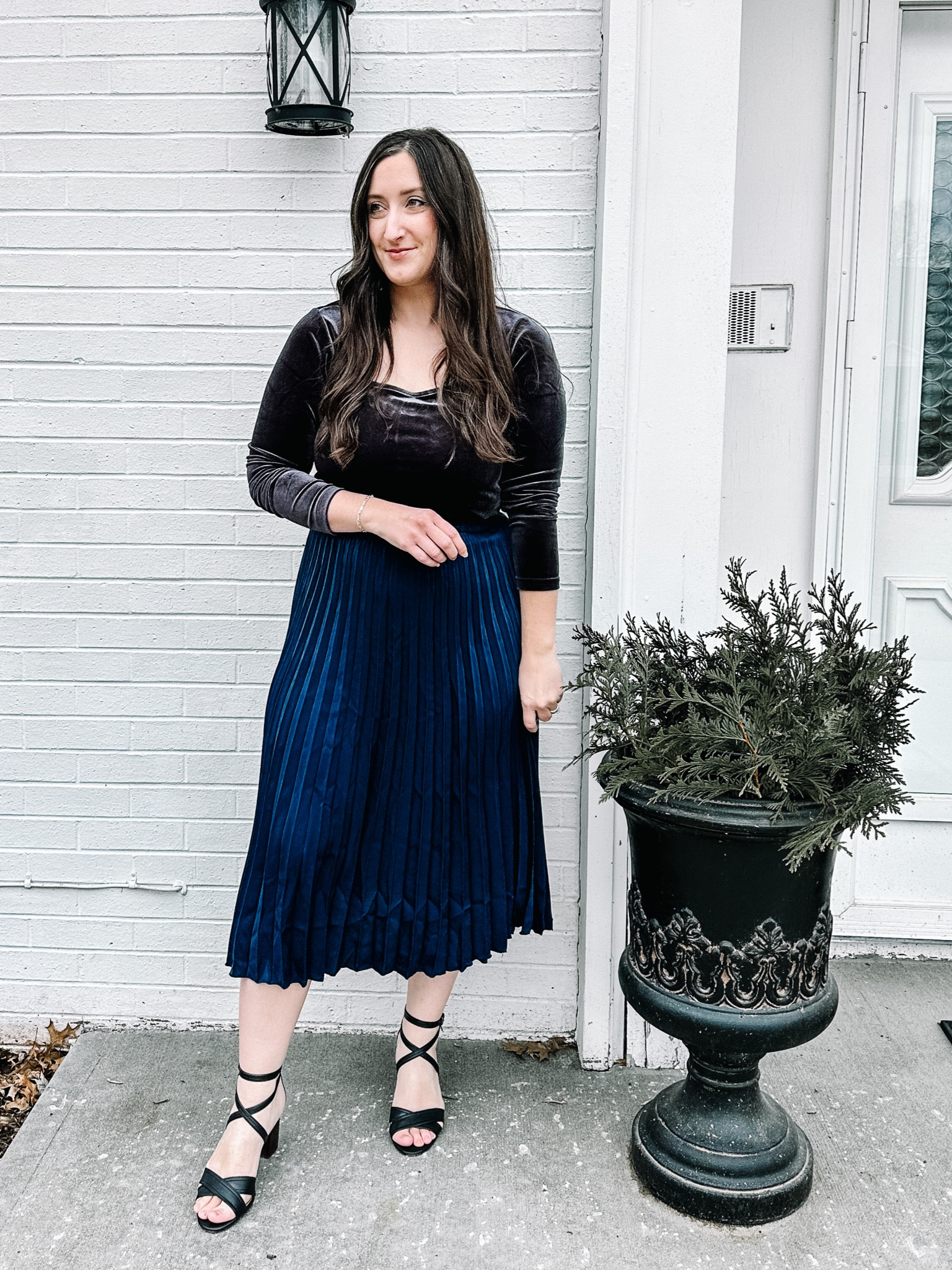 Perfect holiday look with a velvet body suit and pleated skirt. 


#LTKsalealert #LTKstyletip #LTKunder100