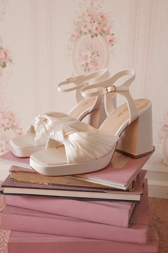 Style your best wedding looks or seasonal looks in the Remie White Satin Knotted Platform High Heel Sandals. These sandals are under $60.

Keywords: Spring heels, high heel sandals, wedding heels, bridal shower, engagement party, Easter outfits women, Easter outfit heels, garden party, garden party heels, summer soirée, summer heels, date night outfits, day dates, party heels, mules



#LTKWedding #LTKFestival #LTKgrwm