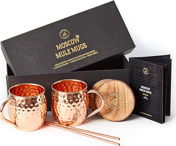 Moscow Mule Copper Mugs Set - 2 Authentic Handcrafted Copper Mugs (16 oz.), 2 Straws, 2 Solid Woo... | Amazon (US)