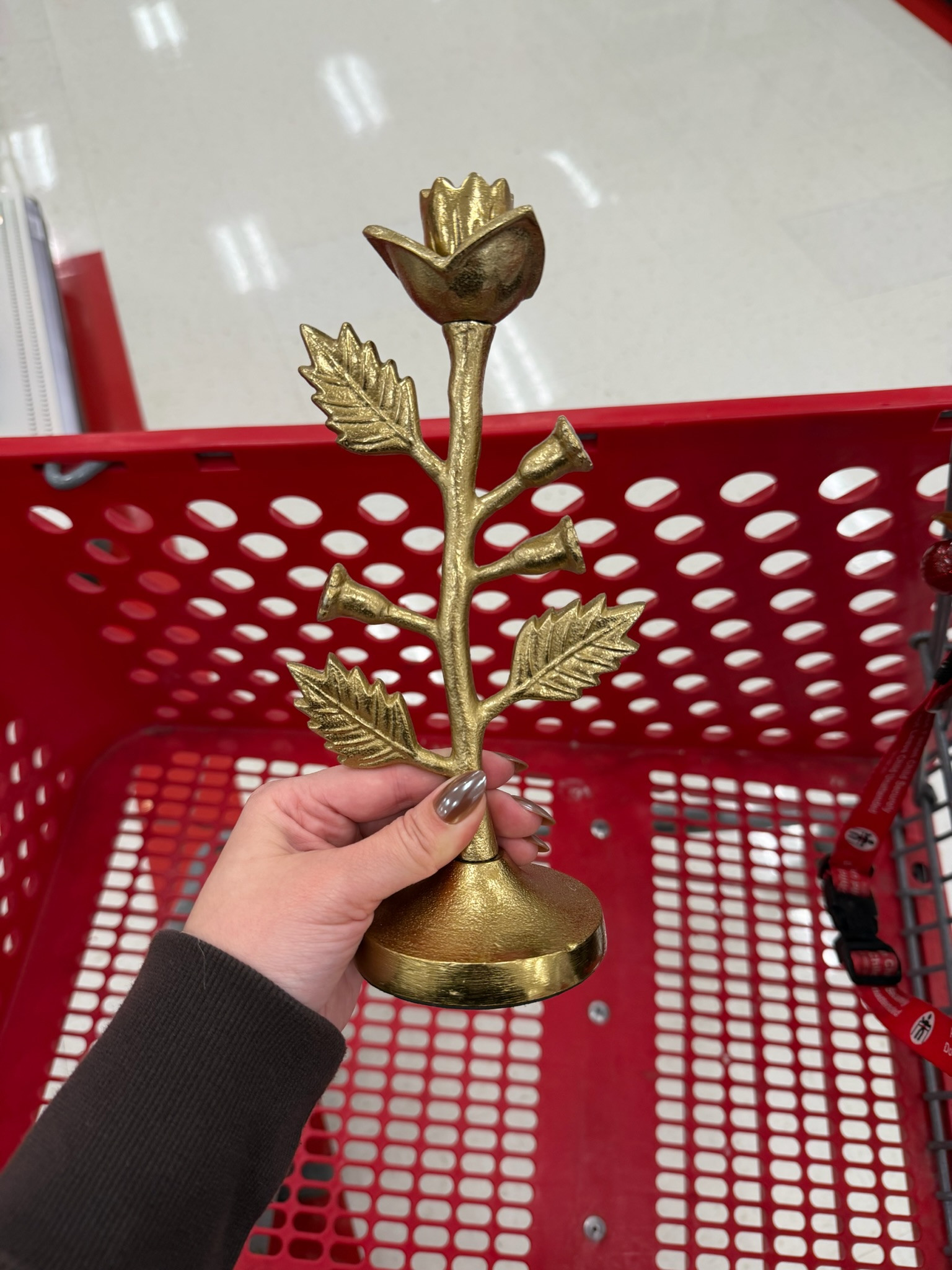 This gold metal botanical taper candle holder from Threshold is such a pretty Easter decor piece, the floral design makes it feel seasonal but the warm gold finish works year round for spring tablescapes, hosting, or console styling. date night outfits, vacation outfits beach, work outfits, easter basket stuffers, spring outfits, resort wear 2026, business casual workwear, plus size fashion, rodeo outfit inspo, winter denim, easter decor, target home decor, threshold home, gold candle holder, spring table decor, botanical decor, affordable home finds 

 #LTKSeasonal #LTKHome