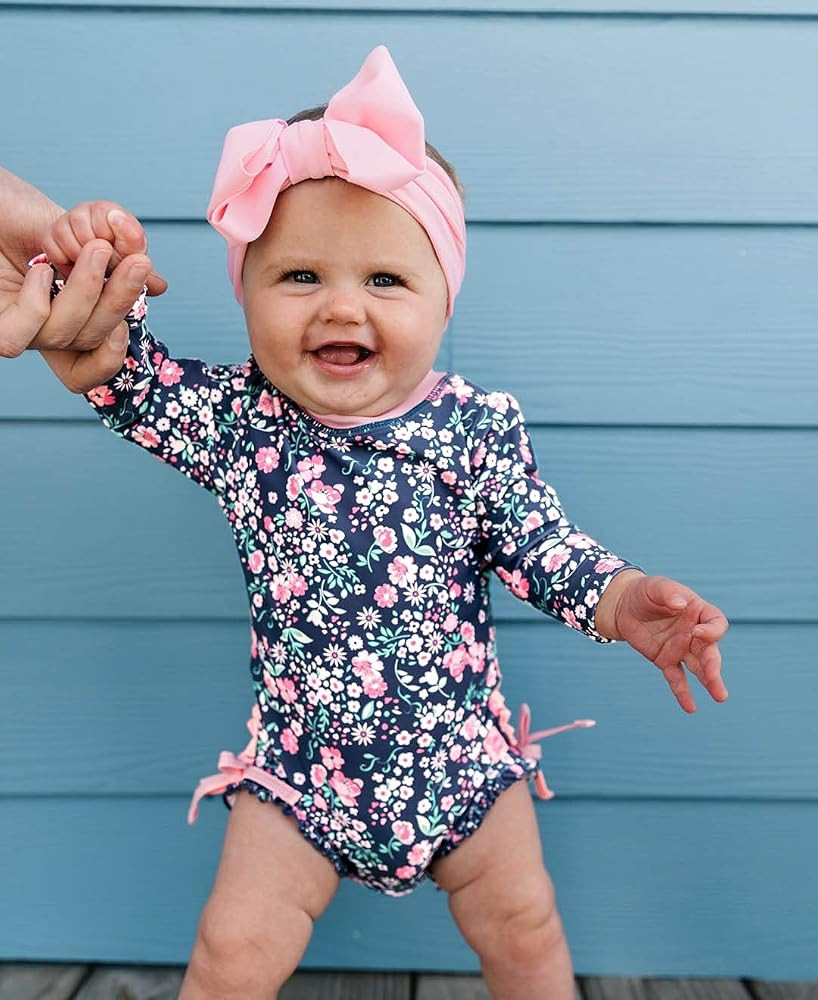 RuffleButts Baby Girls UPF 50+ Sun Protection Floral Printed Long Sleeve One Piece Rash Guard Swi... | Amazon (US)