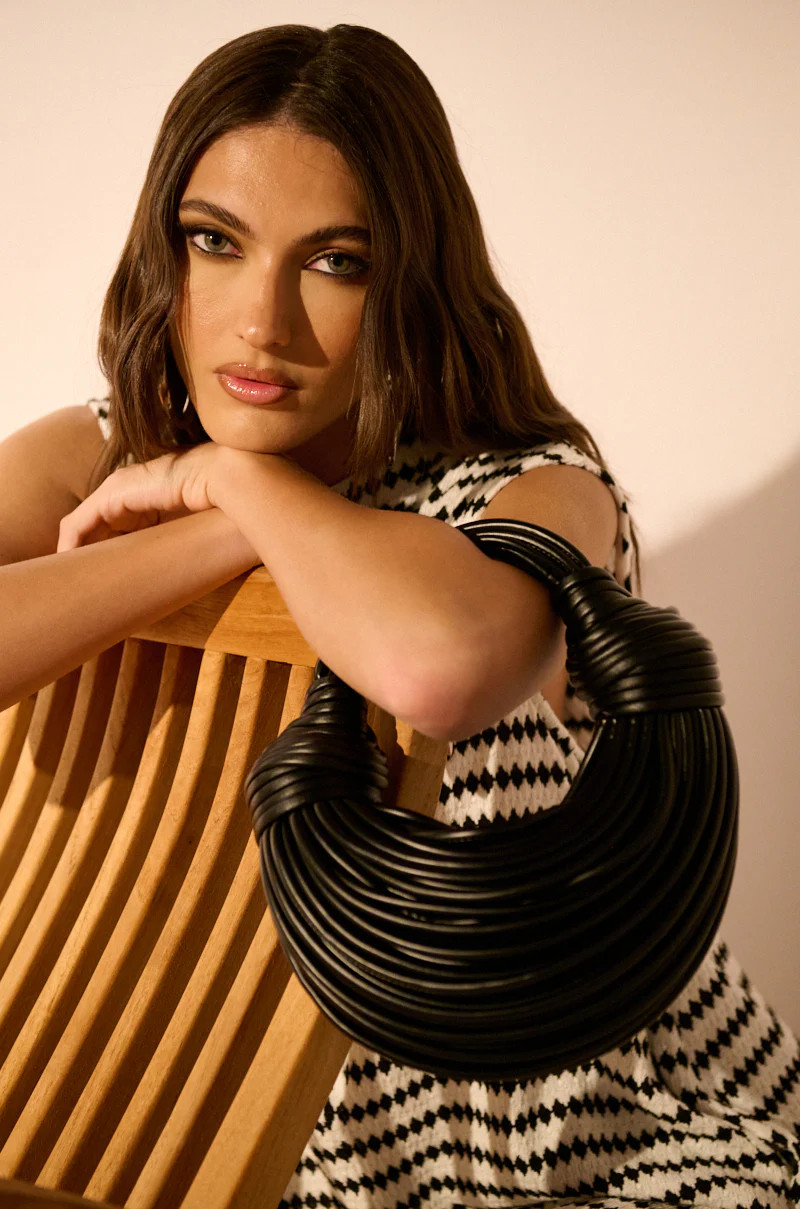 SOMETHING SPECIAL FAUX LEATHER ROPE PURSE IN BLACK | AKIRA