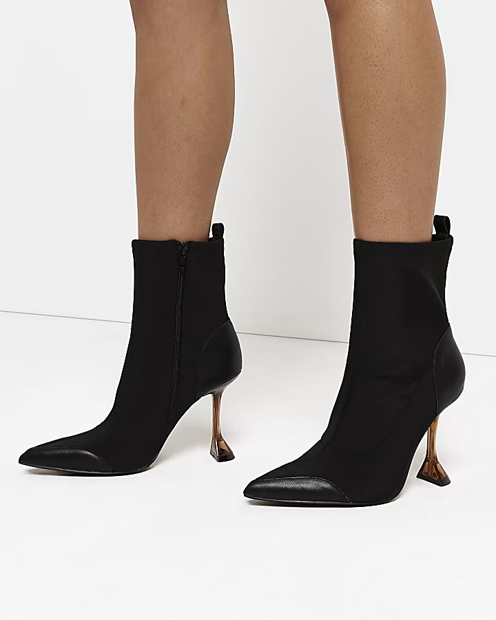 Black scuba flared heeled ankle boots | River Island (US)