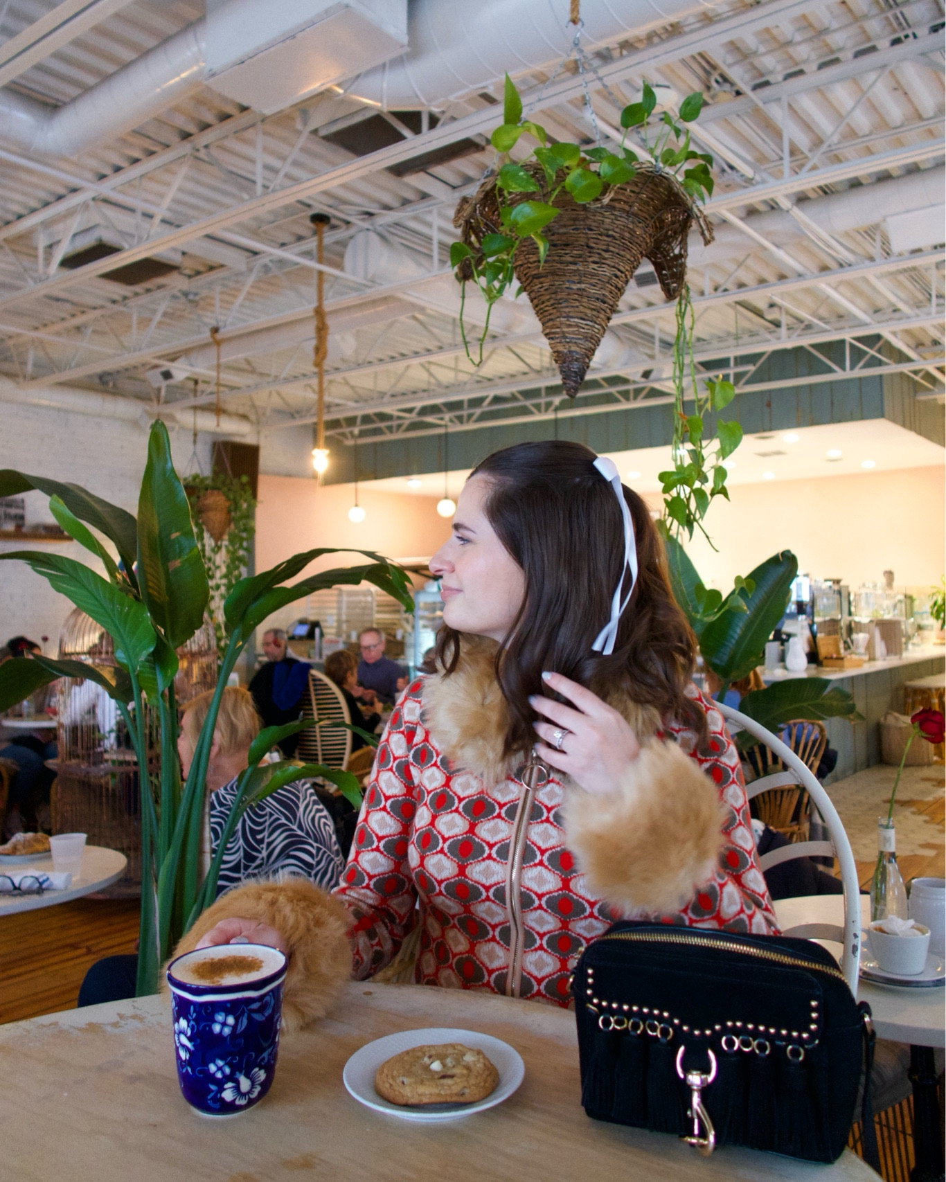 I’m obsessed with hair bows for this holiday season! I paired mine with this cardigan from Show Me Your Mumu that comes in other colors as well! So cute for winter  

#LTKstyletip #LTKSeasonal #LTKfindsunder100